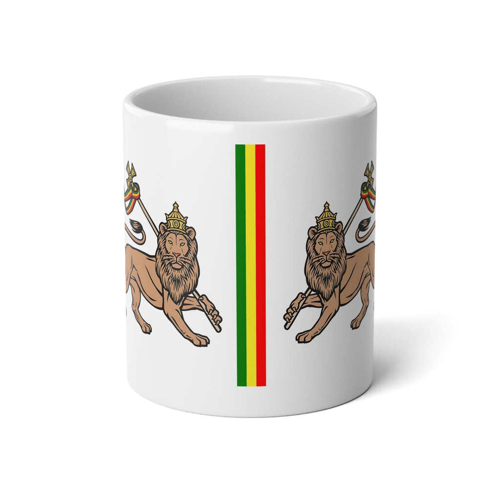 A white ceramic mug featuring a printed design of two lions facing each other on either side of a vertical green, red, and yellow stripe, resembling the flag of Eritrea.