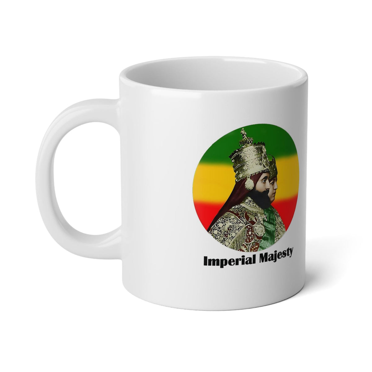 A white ceramic mug featuring a circular graphic of a bearded man in ornate historical clothing, set against the green, yellow, and red Rastafarian flag colors, with the text 'Imperial Majesty' printed below.